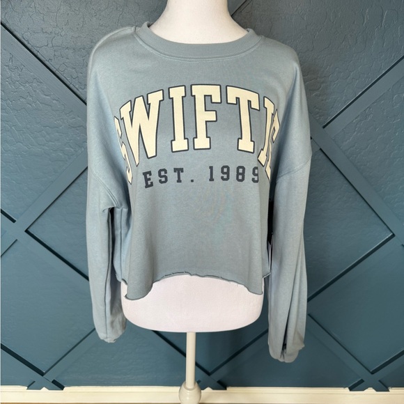 Swiftie Cropped Hoodie in Light Blue - Picture 1 of 5